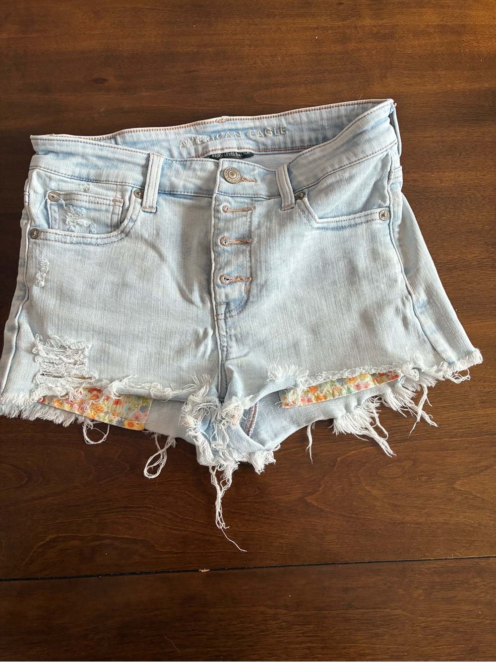 American Eagle Outfitters Light Blue Distressed Denim Shorts with Floral Liner